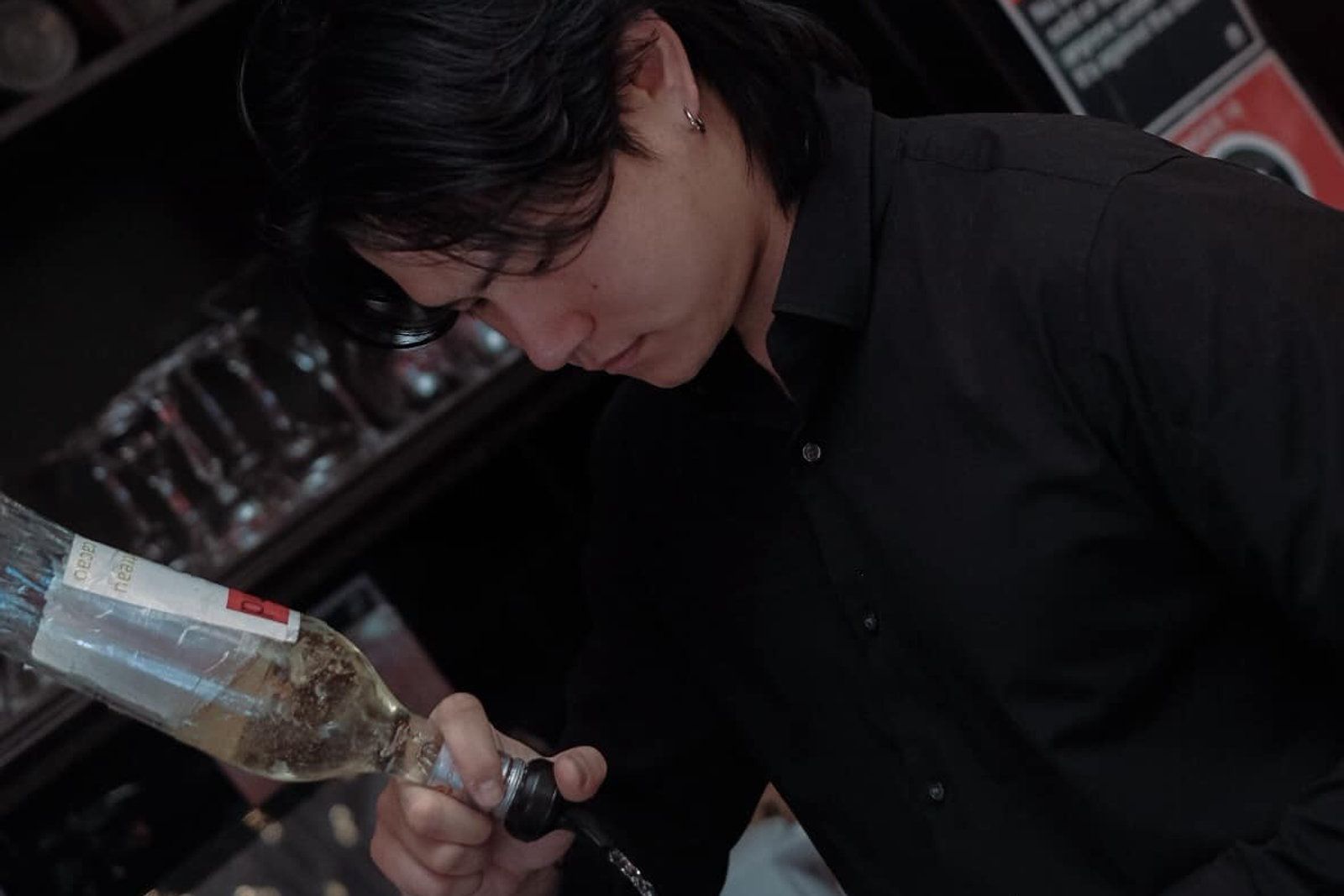 Bartender pouring a drink